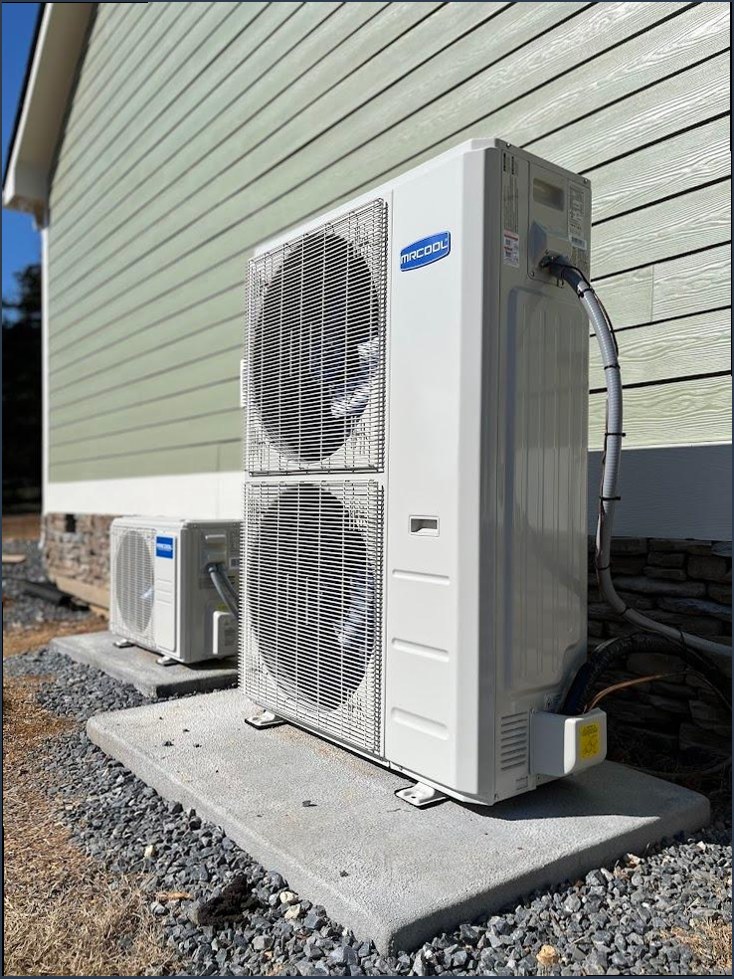Bryant outdoor AC unit on raised platform